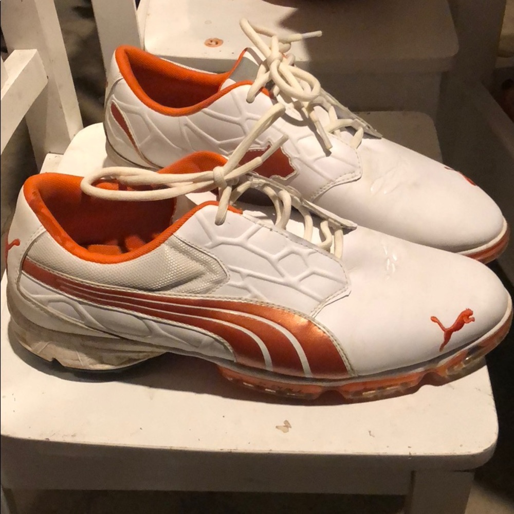 Puma orange and white golf shoes